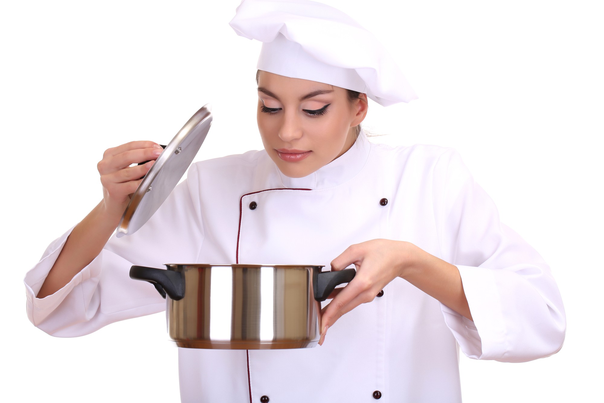 Instructor demonstrating a pan technique over stove